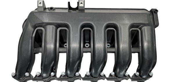 BMW M57N2 intake manifold underside showing runners and mounting flange